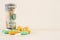 Money from the United States with vibrantly colored medicines on a neutral white background. Concept of health cost. Concept of