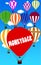 MONEYBACK written on hot air balloon with a blue sky background.