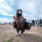 MONGOLIA - May 17, 2015: Specially trained eagle for hunting in mongolian desert near Ulaan-Baator.