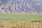 Mongolian mountain natural landscapes with eroded foothill slope