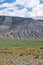 Mongolian mountain natural landscapes with eroded foothill slope