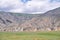 Mongolian mountain natural landscapes with eroded foothill slopes near lake Tolbo-Nuur in north Mongolia