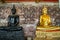 Monk black and golden image of Buddha