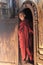 Monk at the door of the monastery