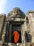 A monk enters Bayon Temple at Angkor Thom, Cambodia