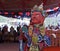 Monk pefrorms ritual dance at buddhist festival