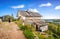 A monk and a refectory in the Calvary-Crucifixion hermitage on the mountain on Anzer Island Solovetsky Islands