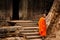 Monk in saffron robes at Angkor Wat