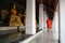 A monk walk in a temple in peaceful moment ,Bangkok,Thailand.