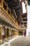 Monk walking in the courtyard of the Dzong in Punakha Bhutan