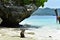 A monkey enjoys the sound of the sea at Monkey Beach