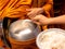 The monks of the Buddhist Sangha give alms to a Buddhist monk, which came out of the Buddhist offerings in the morning. The