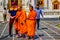 Monks getting their picture taken at The Marble Temple