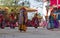 Monks perform masked and costumed dance of Tibetan Buddhism during the Cham Dance Festival. Dancers blurred motion