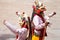 Monks perform a religious masked dance of Tibetan Buddhism