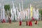 Monks and prayer flags, Chimi Lhakang, Punakha, Bhutan