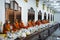 Monks sitting between thai people join tradition make merit offer food to the monk and ritual respect praying blessing wish holy