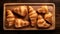 Monochromatic Harmony: Zbrush Croissants On Wooden Board