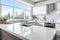 Monochromatic kitchen with crisp white walls and cabinets. White quartz countertops, city view from window