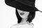 Monochrome beauty shots of an elegant woman in a hat