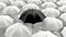 Monochrome Contrast: Black Umbrella Amidst a Sea of White