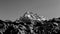 Monochrome image of a majestic peak with clear sky