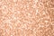 Monochrome Peach Fuzz sparkling bokeh background. Trendy color of year 2024 Peach Fuzz