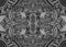 Monochrome psychedelic kaleidoscope background with many crazy geometric pattern