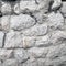 Monochrome shot of stone wall texture background