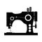 Monochrome silhouette sewing machine icon