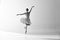 Monochrome. Young graceful ballerina posing in studio and demonstrating elegant movement