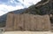 Monolith sacred stone at Ollantaytambo archaeological site in the Sacred Valley of Peru