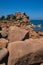 Monolithic blocks of pink granite in the Cotes d\\\'Armor in Brittany. Pink granite coast