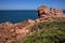 Monolithic blocks of pink granite in the Pink granite coast in Brittany, France.