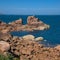 Monolithic blocks of pink granite in the Pink granite coast in Brittany, France.