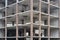 Monolithic construction of a multi-storey apartment building. Unfinished construction and reinforced concrete house frame