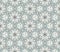 The monotonous discreet pattern consists of hexagonal stars and hexagons. Seamless texture. Vector