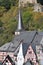 Monreal, Germany - 09 23 2020: half-timbered houses with stone church and Philipburg