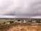 A monsoon cloud burst in the countryside around the ancient Thirumayam fort in