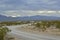 Monsoon rain clouds over mountain range edge of dry Mojave Desert valley Nevada, USA