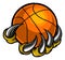 Monster or animal claw holding Basketball Ball