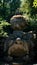 Monstrous sculpture called of Proteus and Glaucus at the Park of the Monsters of Bomarzo among trees and vegetation