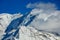 Mont Blanc massive mountains with clouds on one side