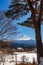 Mont Fuji on a clear winter day, from Saiko village covered by pristine snow in the five lakes region