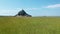 Mont-Saint-Michel, France, back traveling aeral view from the countryside