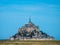 Mont Saint Michel island pyramid into a sunny blue sky in Bretagne France