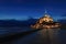Mont Saint Michel monastery and bay landmark night view. Normandy, France