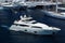 Monte Carlo, Monaco - December 08, 2009: motor yacht in navigation from port. Water craft in blue sea. Luxury lifestyle