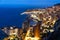 Monte Carlo panorama illuminated by night. Urban landscape with luxury architecture