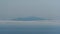 Monte Cristo island in clouds - Italy seen from Corsica